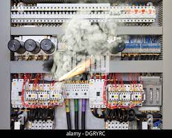 Control relay in an automation panel starting to smoke and catch fire.